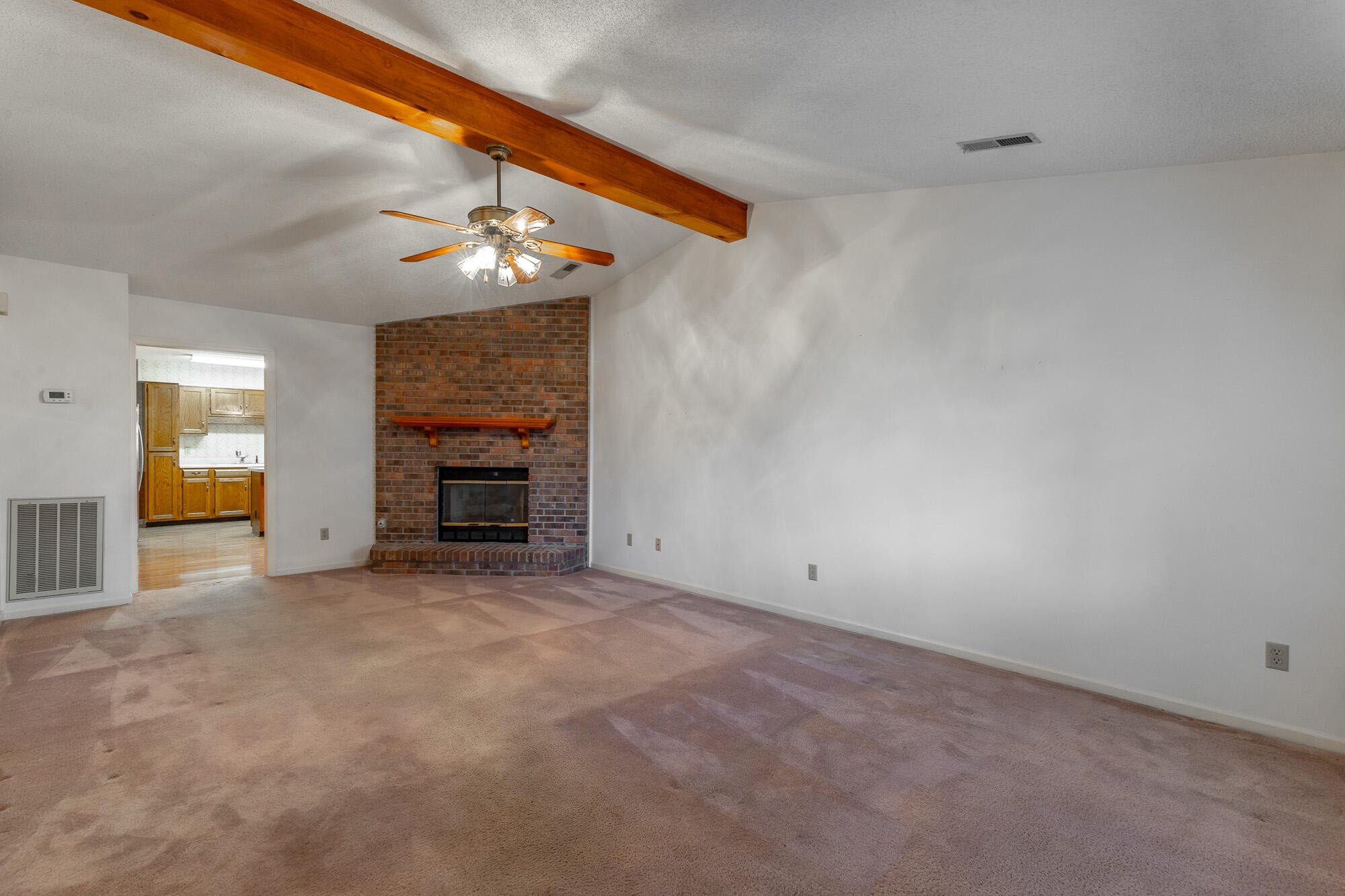 6780 Hickory Creek Road Chattanooga, TN 37421 - Photo 7 of 60 a view of an empty room with a fireplace