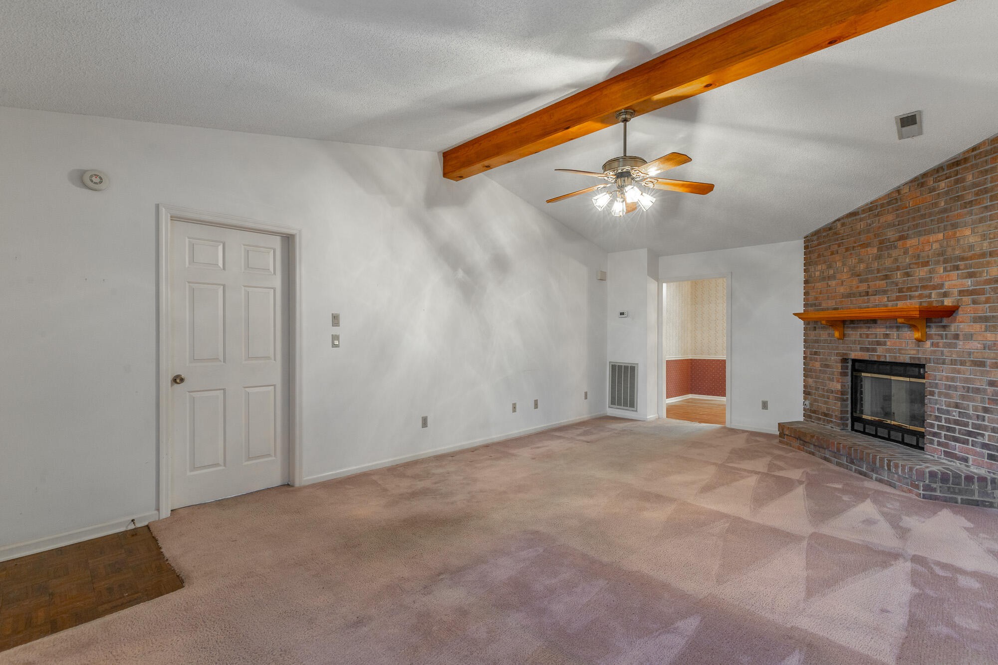 6780 Hickory Creek Road Chattanooga, TN 37421 - Photo 8 of 60 a view of an empty room with a fireplace