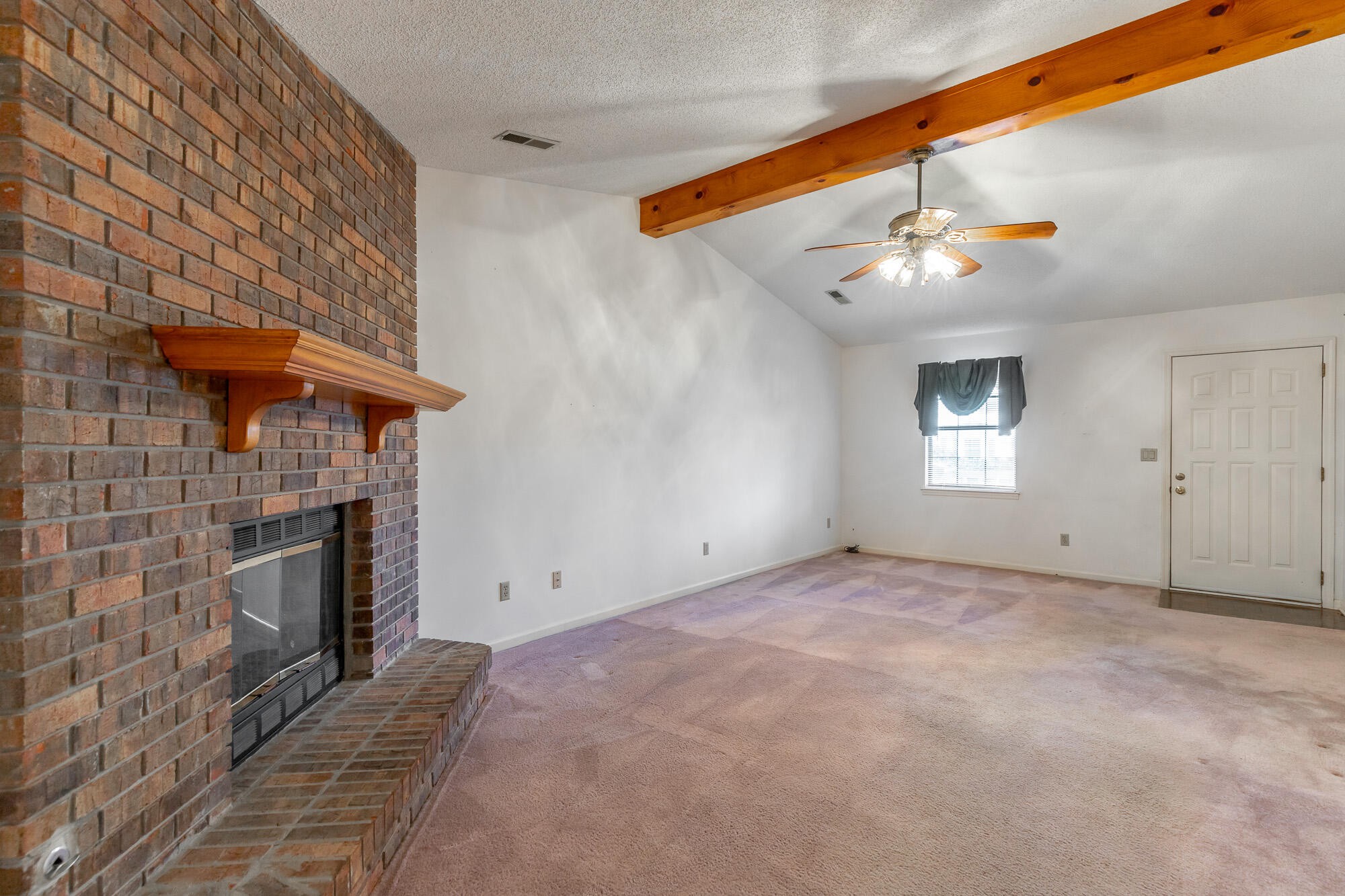 6780 Hickory Creek Road Chattanooga, TN 37421 - Photo 9 of 60 a view of a livingroom with a fireplace and furniture