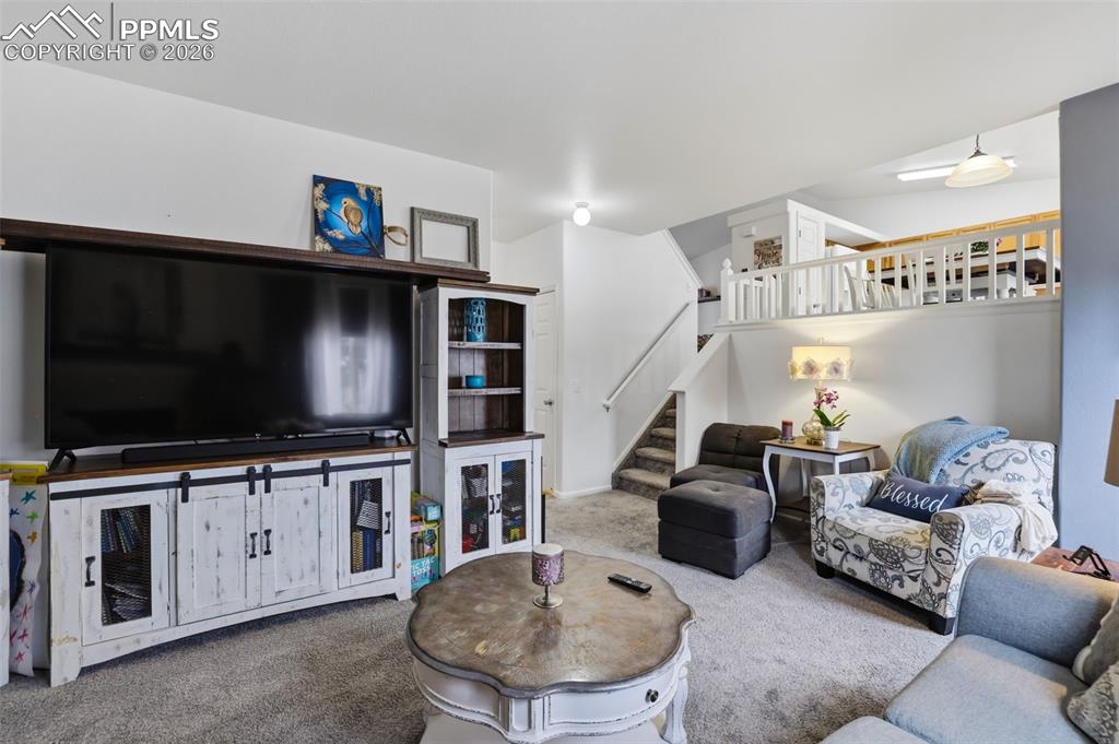 12841 Fishers Island Road Peyton, CO 80831 - Photo 11 of 32 Lower living room