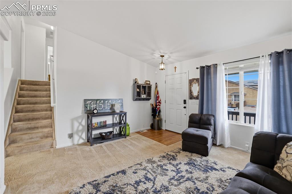 12841 Fishers Island Road Peyton, CO 80831 - Photo 13 of 32 lower living room