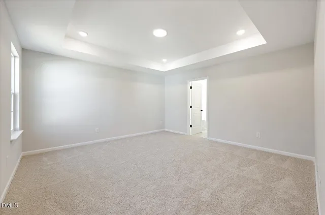 an empty room with a bathroom