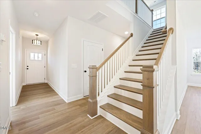 a view of entryway with wooden floor