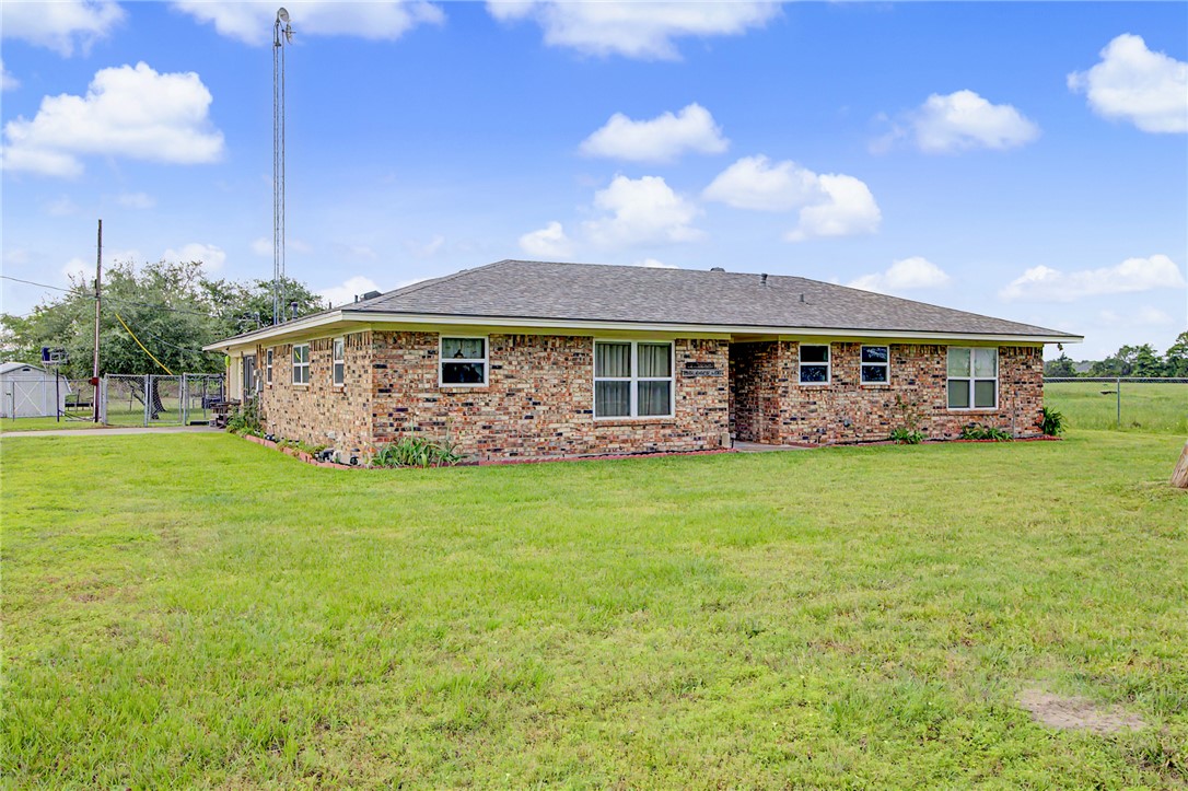 11576 Carter Lane Bryan, TX 77808 - Photo 14 of 50 a view of a house with a big yard