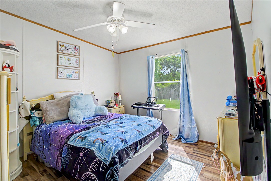 11576 Carter Lane Bryan, TX 77808 - Photo 48 of 50 a bedroom with double bed and a window