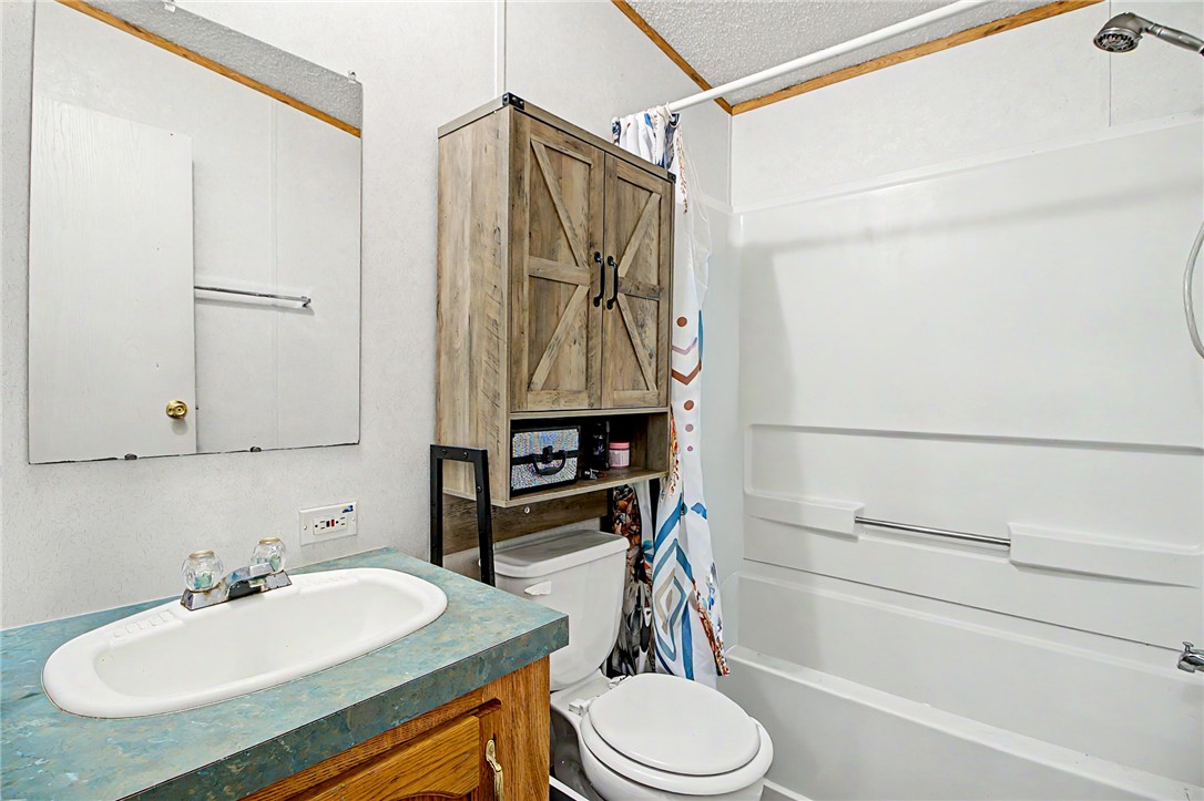11576 Carter Lane Bryan, TX 77808 - Photo 50 of 50 a bathroom with a sink toilet and shower