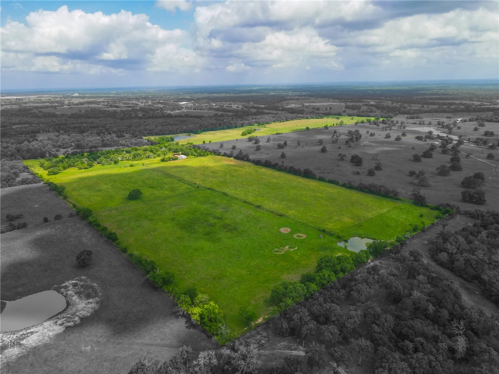 11576 Carter Lane Bryan, TX 77808 - Photo 10 of 50 a view of a lake with a big yard