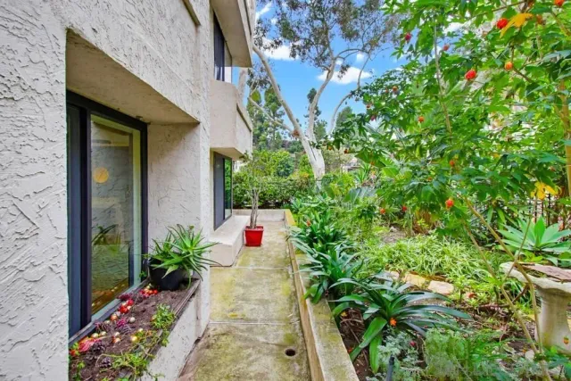 a view of balcony with yard