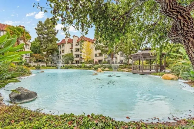 a view of building with swimming pool