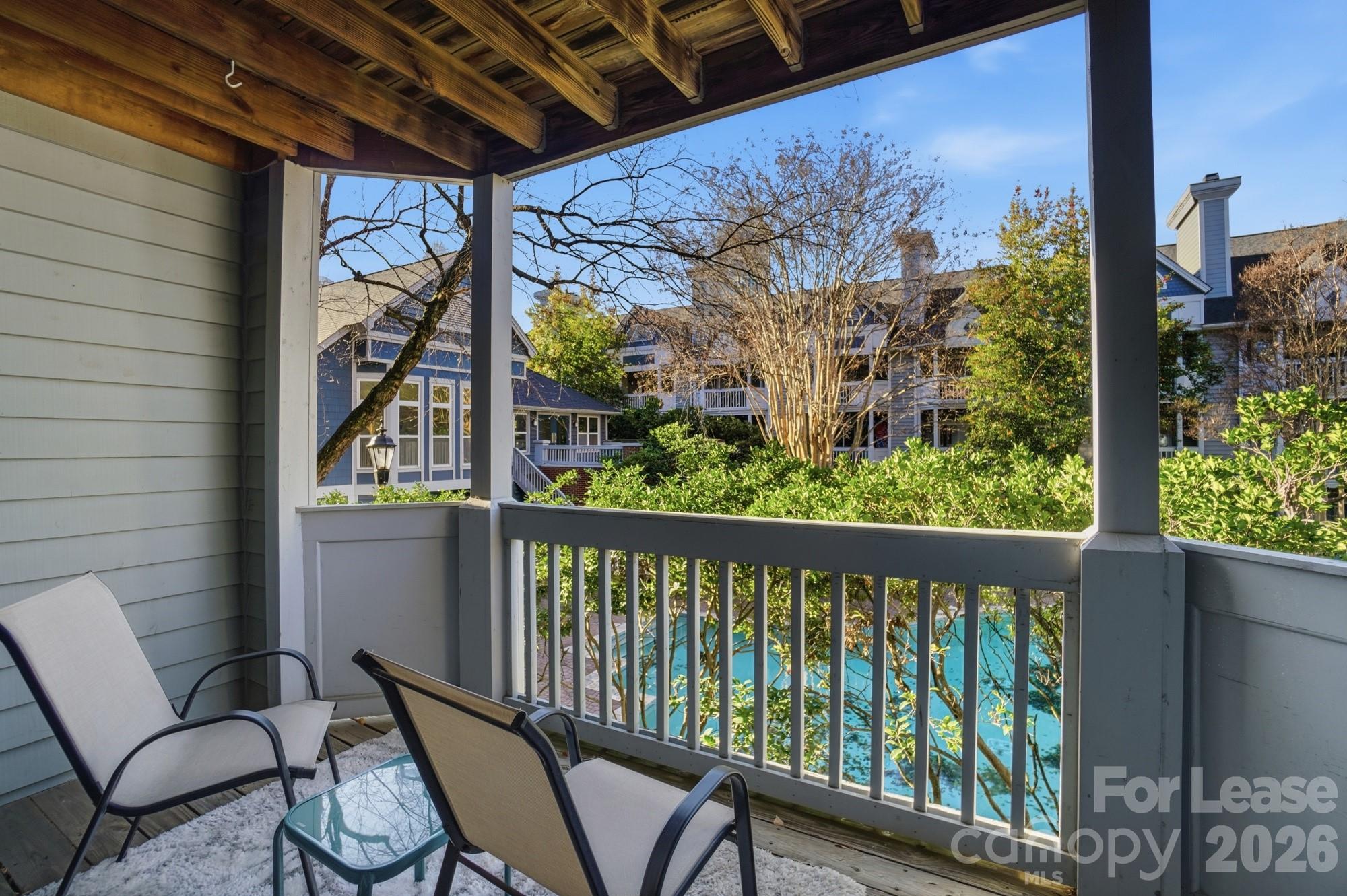 525 North Graham Street, Unit 2F Charlotte, NC 28202 - Photo 16 of 18 a view of a porch with furniture