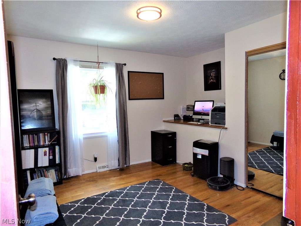2092 Wyndham Road Akron, OH 44313 - Photo 16 of 31 3rd bedroom with hardwood floors and natural light
