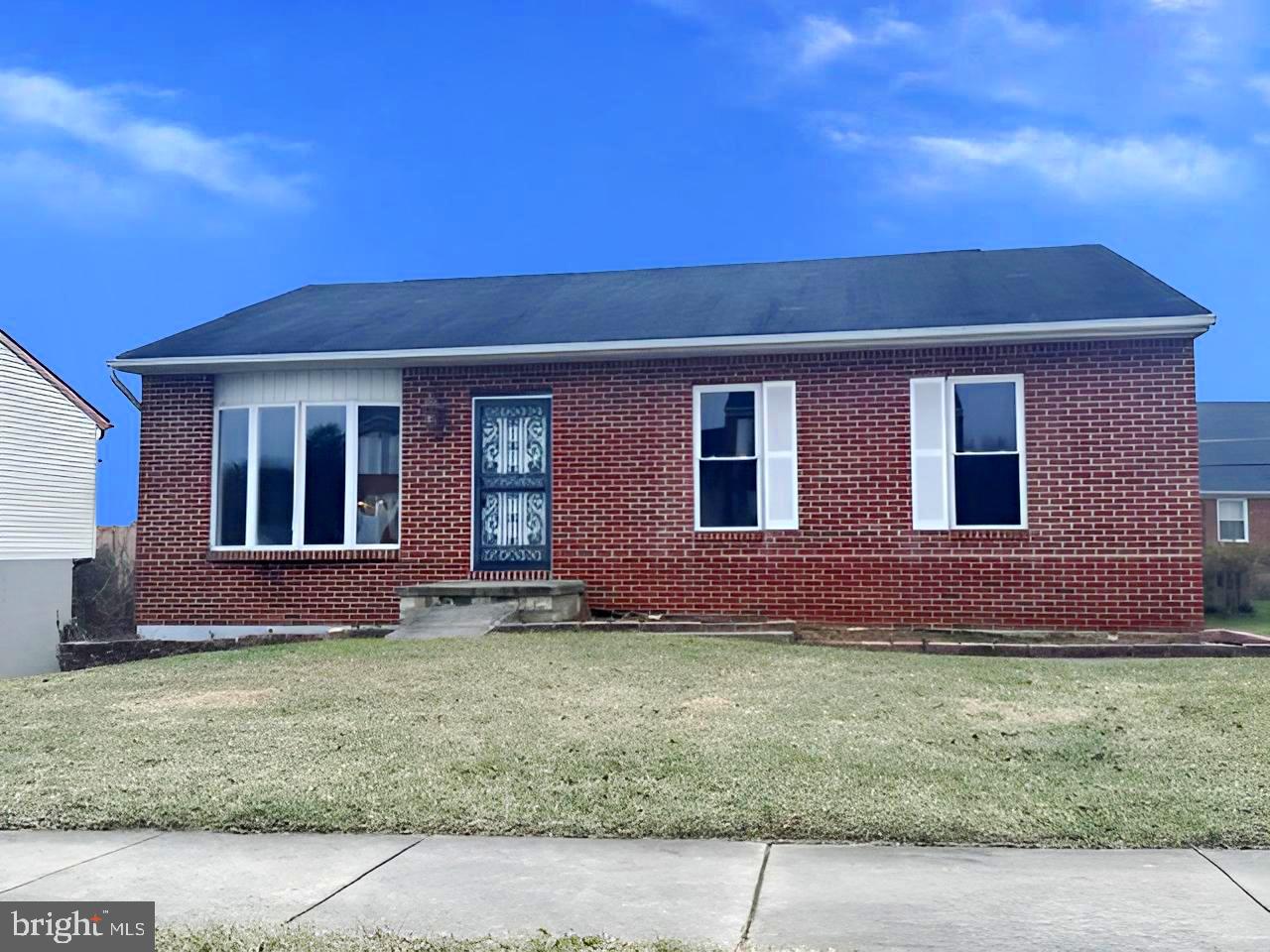 a view front of house with a yard