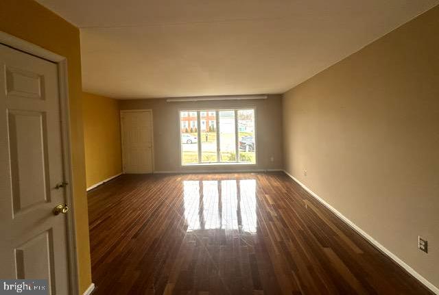 3 Morning Star Court Baltimore, MD 21206 - Photo 13 of 43 a view of an empty room and wooden floor