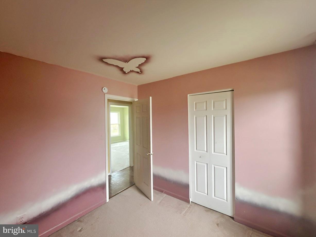 3 Morning Star Court Baltimore, MD 21206 - Photo 14 of 28 a view of an empty room with a window