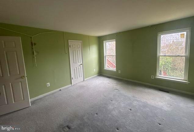 3 Morning Star Court Baltimore, MD 21206 - Photo 15 of 43 a view of an empty room with window and closet area