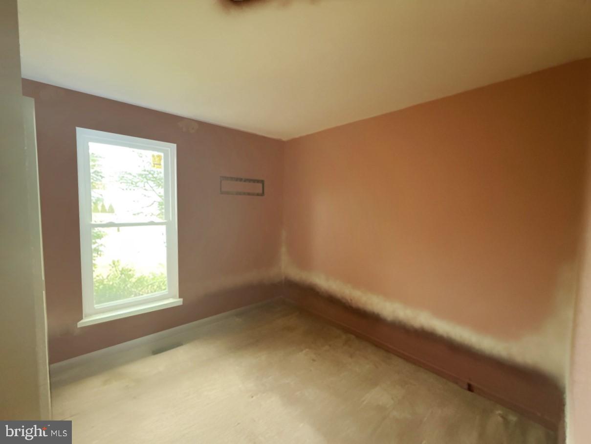 3 Morning Star Court Baltimore, MD 21206 - Photo 15 of 28 an empty room with a window