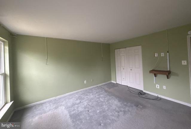 3 Morning Star Court Baltimore, MD 21206 - Photo 16 of 43 an empty room with a empty space and windows