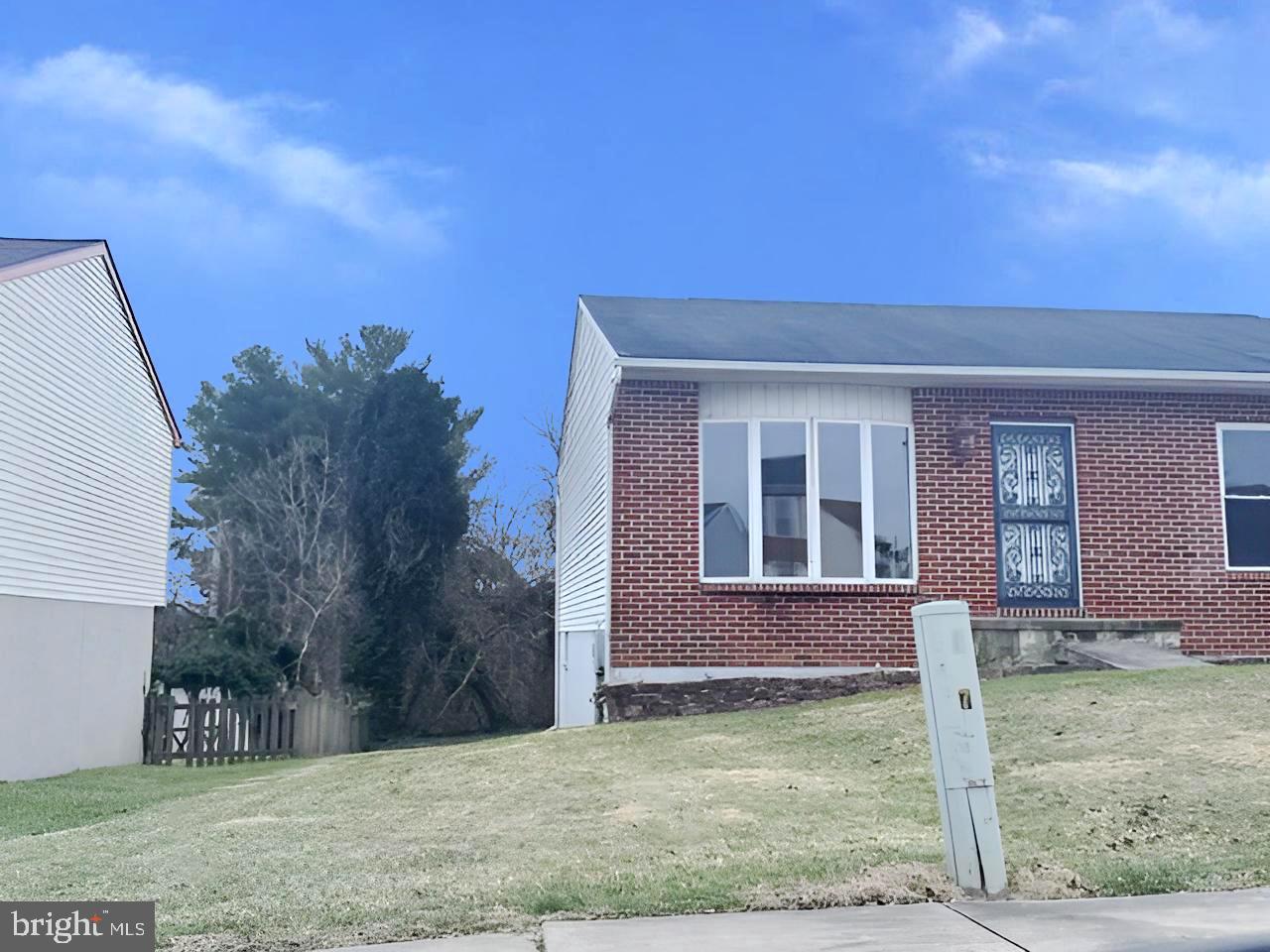 3 Morning Star Court Baltimore, MD 21206 - Photo 2 of 28 a front view of a house with garden
