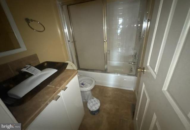 3 Morning Star Court Baltimore, MD 21206 - Photo 28 of 43 a bathroom with a granite countertop sink a toilet and bathtub