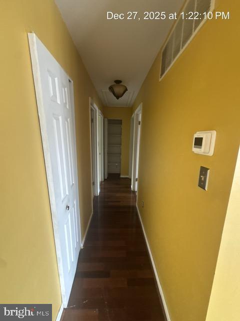 3 Morning Star Court Baltimore, MD 21206 - Photo 41 of 43 a view of a hallway with wooden floor and a bathroom