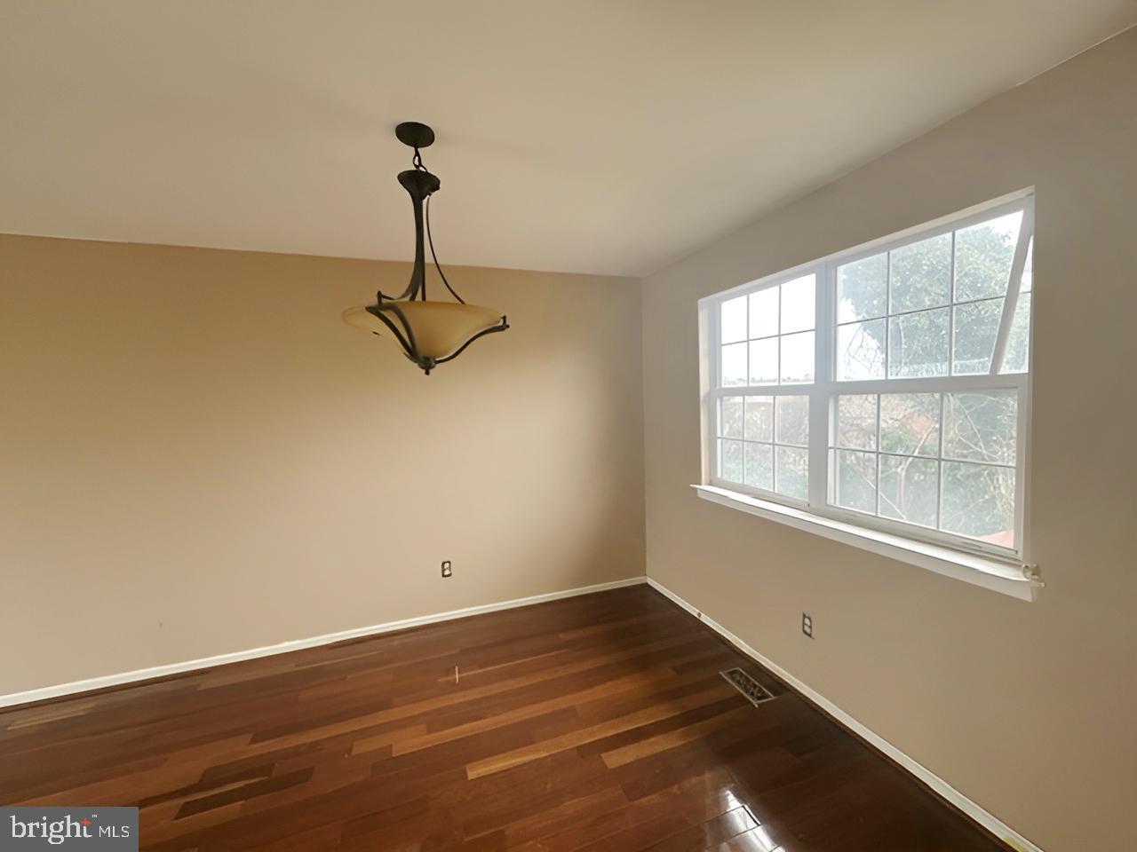 3 Morning Star Court Baltimore, MD 21206 - Photo 7 of 28 a view of a room with wooden floor and windows
