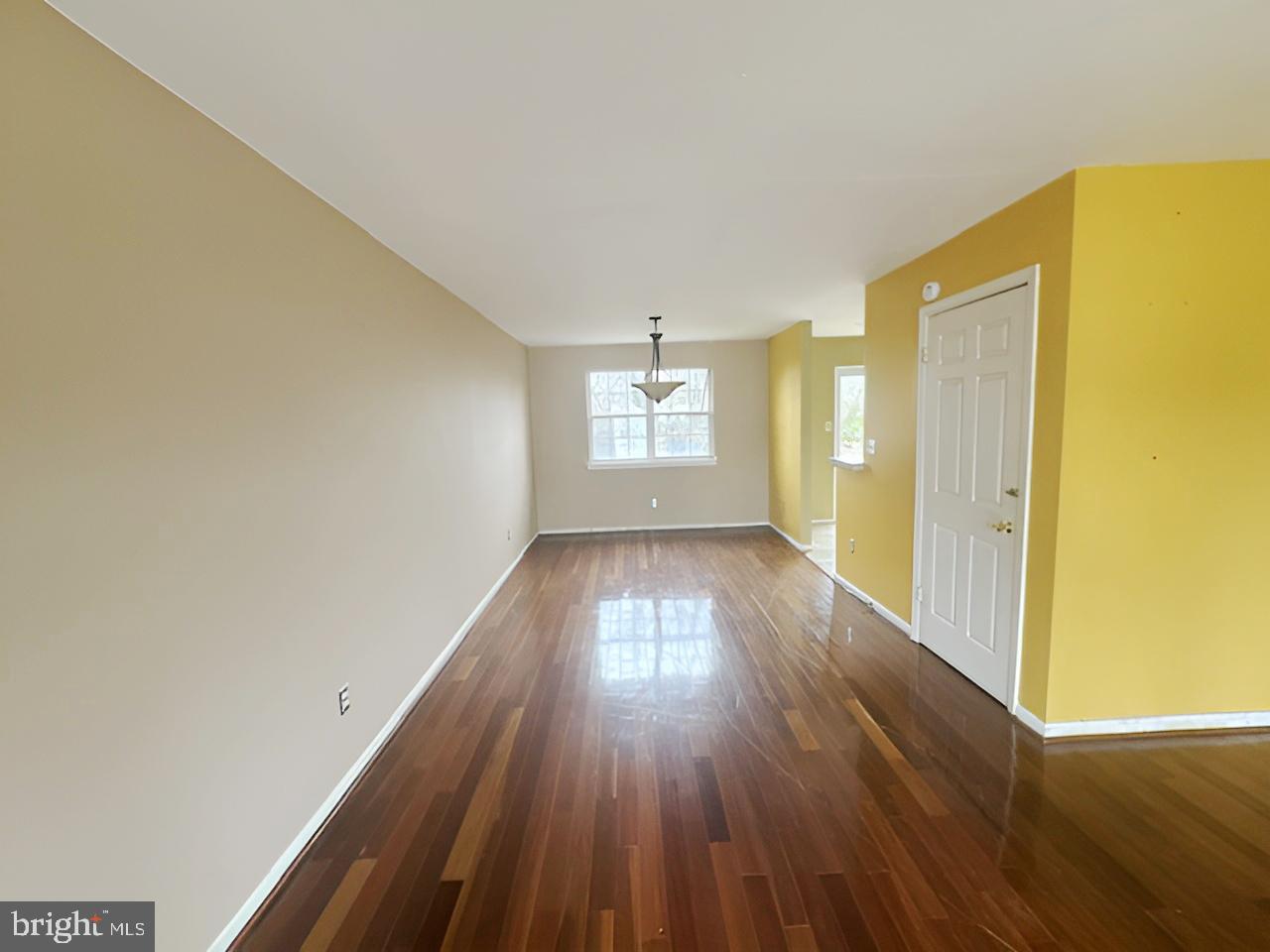 3 Morning Star Court Baltimore, MD 21206 - Photo 8 of 28 a view of empty room with wooden floor and fan