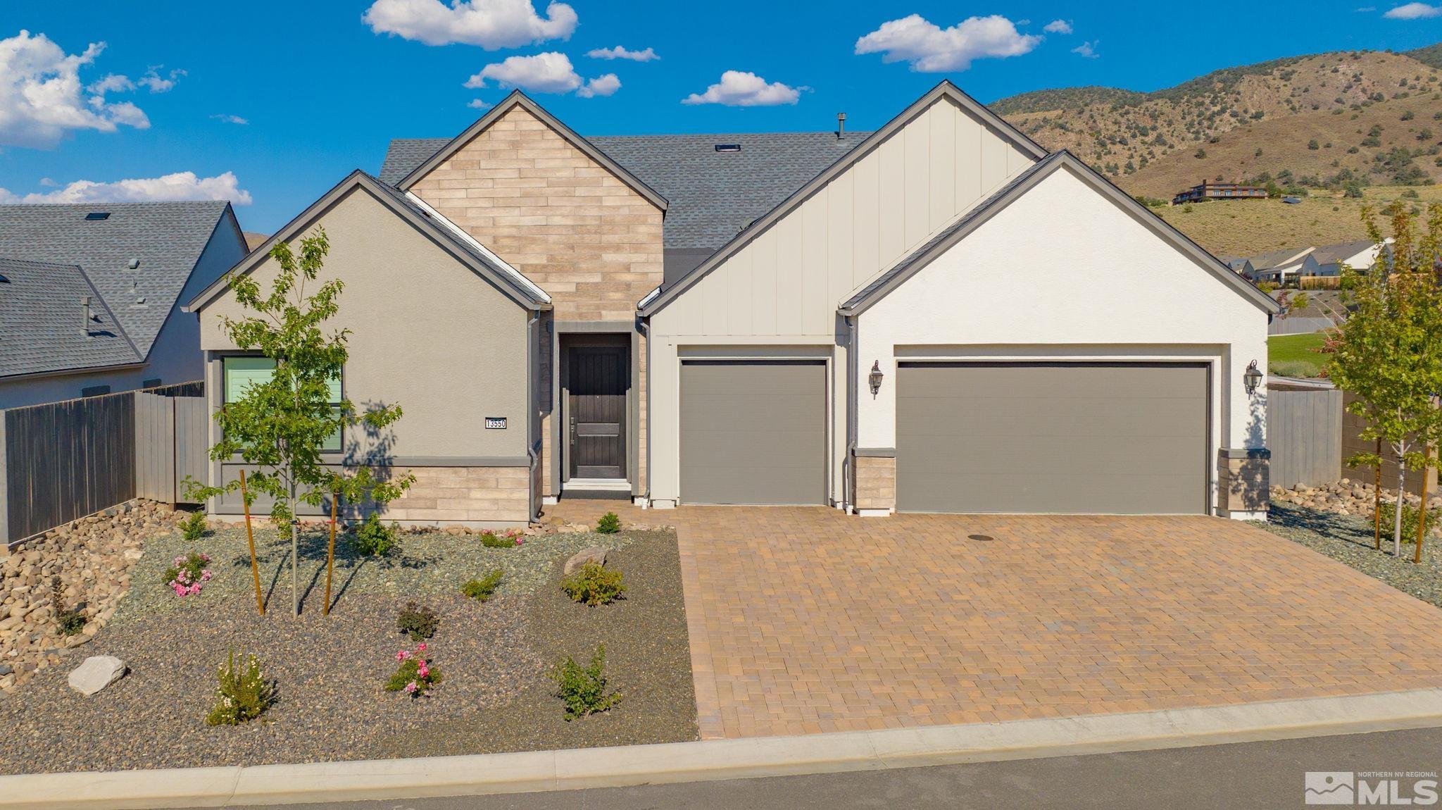 13550 Water Willow Street Reno, NV 89521 - Photo 1 of 37 a view of a house with a backyard
