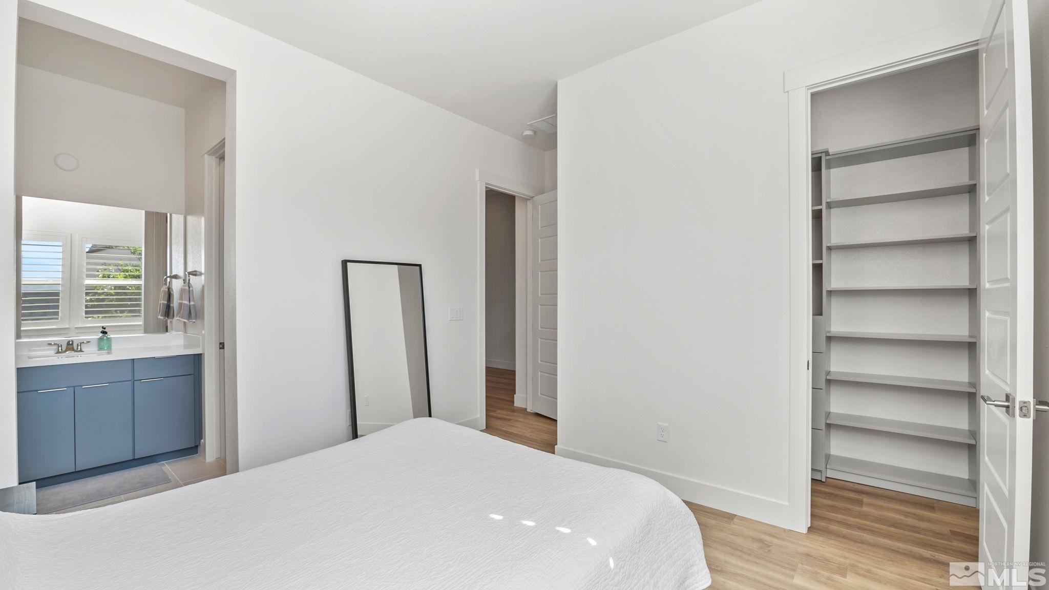 13550 Water Willow Street Reno, NV 89521 - Photo 28 of 37 a bedroom with a bed and a window