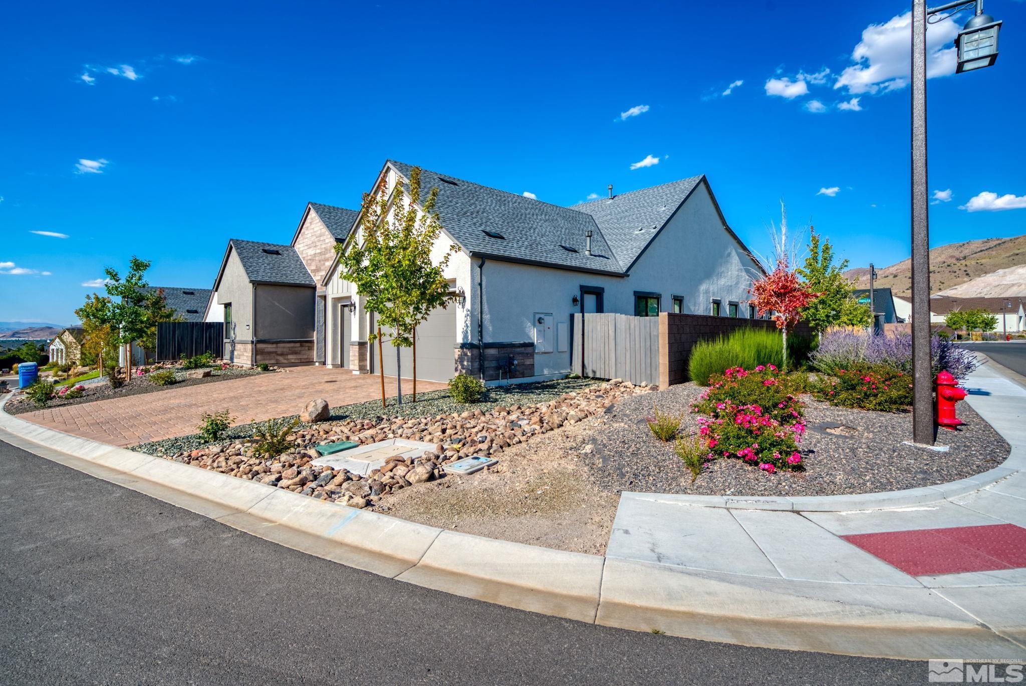 13550 Water Willow Street Reno, NV 89521 - Photo 32 of 37 a front view of a house with a yard
