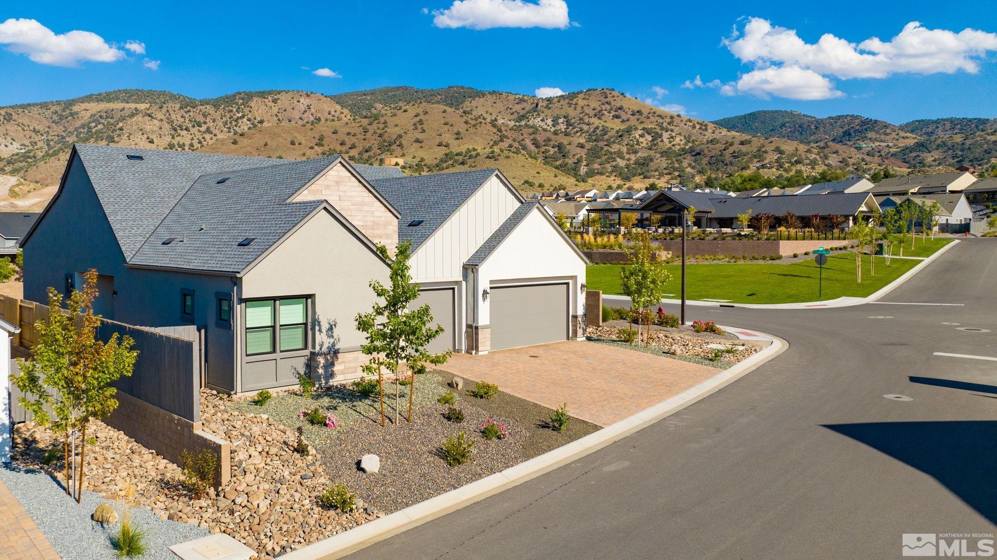 13550 Water Willow Street Reno, NV 89521 - Photo 34 of 37 a view of a house with roof and sitting space