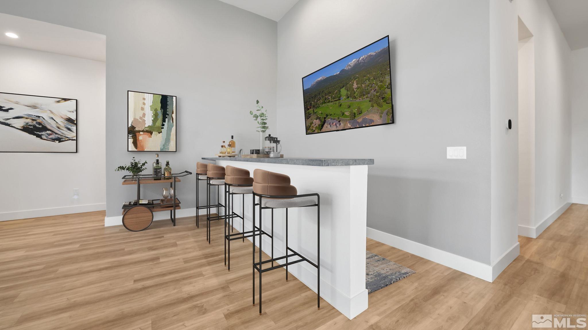 13550 Water Willow Street Reno, NV 89521 - Photo 6 of 37 a workspace with furniture and wooden floor