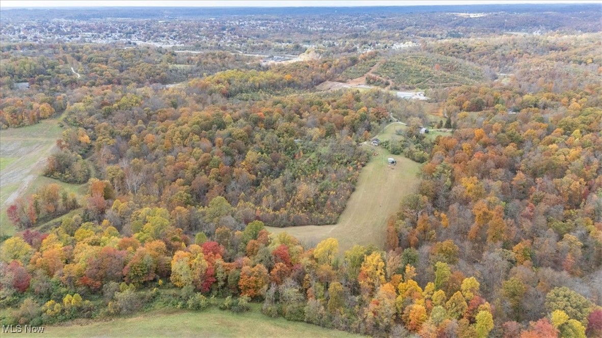 861 Roth Road Parkersburg, WV 26104 - Photo 10 of 20 Aerial view of property's location with a heavily wooded area