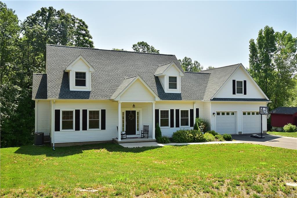 1044 Ratley Road Suffield, CT 06093 - Photo 1 of 1 a front view of a house with a yard