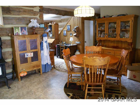 2679 Shutterlee Mill Road Staunton, VA 24401 - Photo 15 of 34 a dining area with furniture and a chandelier
