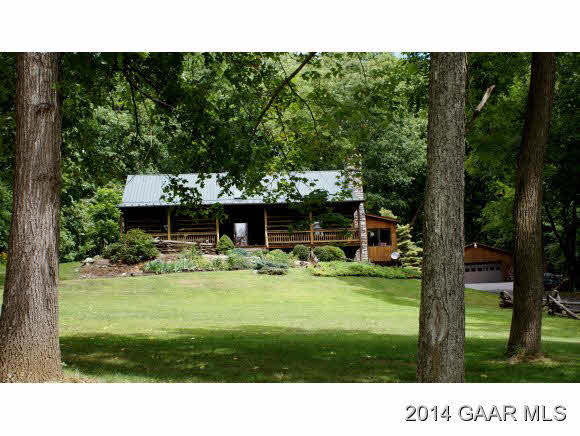 2679 Shutterlee Mill Road Staunton, VA 24401 - Photo 2 of 34 a view of a house with backyard porch and garden