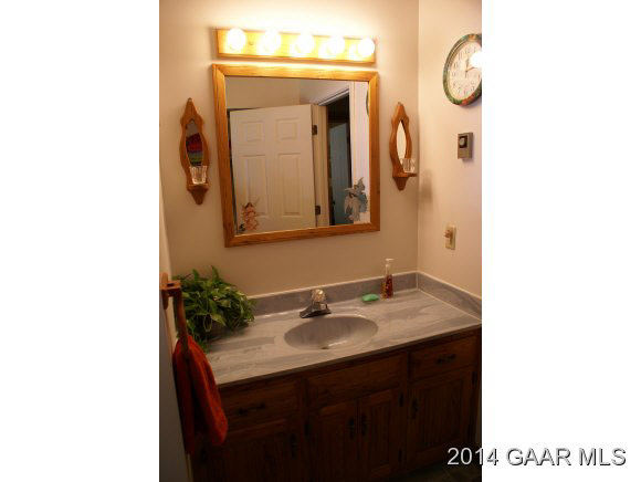 2679 Shutterlee Mill Road Staunton, VA 24401 - Photo 22 of 34 a bathroom with a sink and a mirror