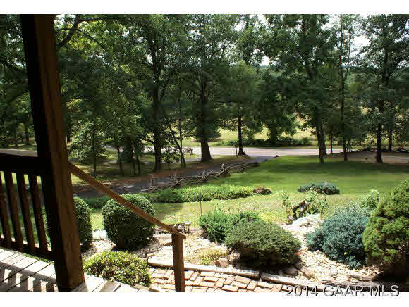 2679 Shutterlee Mill Road Staunton, VA 24401 - Photo 4 of 34 a view of a garden with a bench