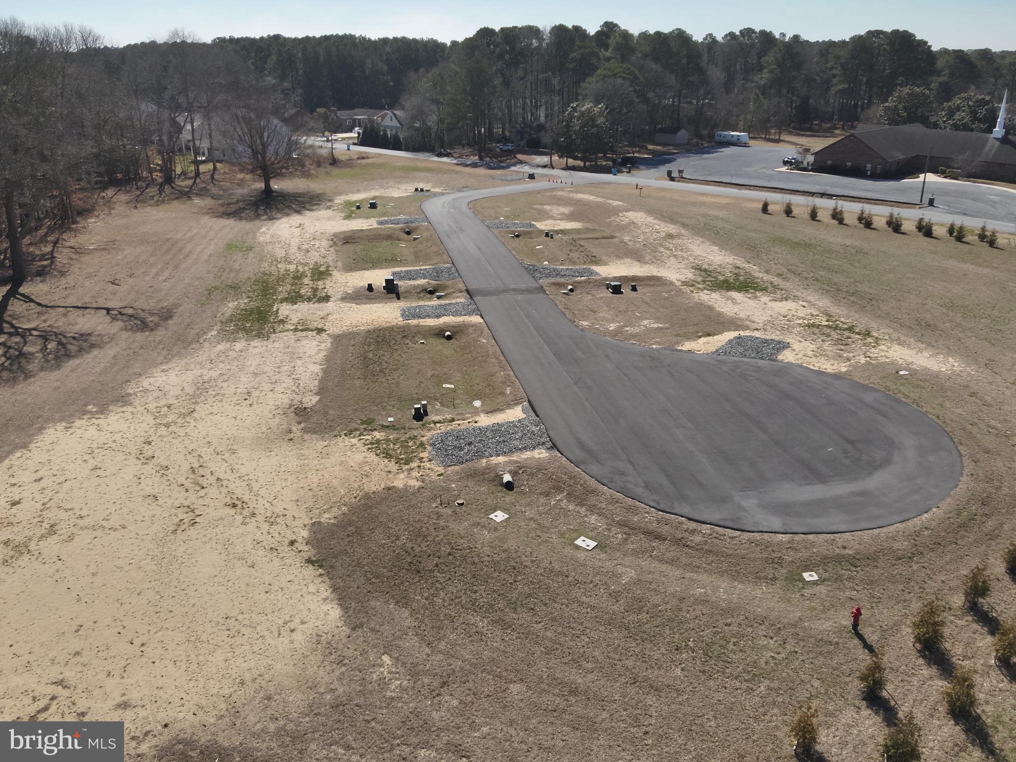 5 Stephen Decatur Highway Ocean City, MD 21842 - Photo 7 of 21 a view of a dry yard with trees
