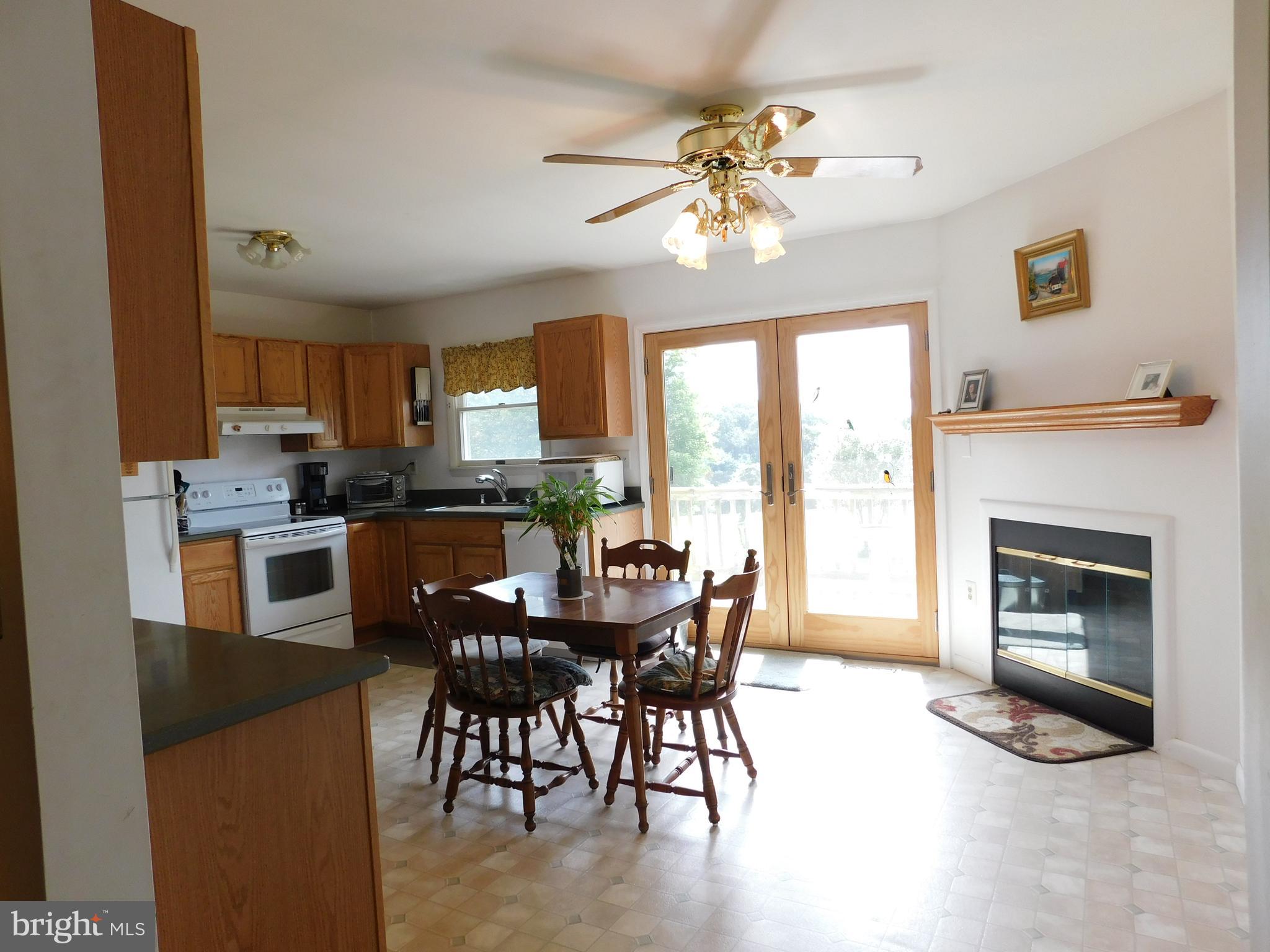 2431 Island Branch Road White Hall, MD 21161 - Photo 11 of 33 Kitchen - view to rear deck