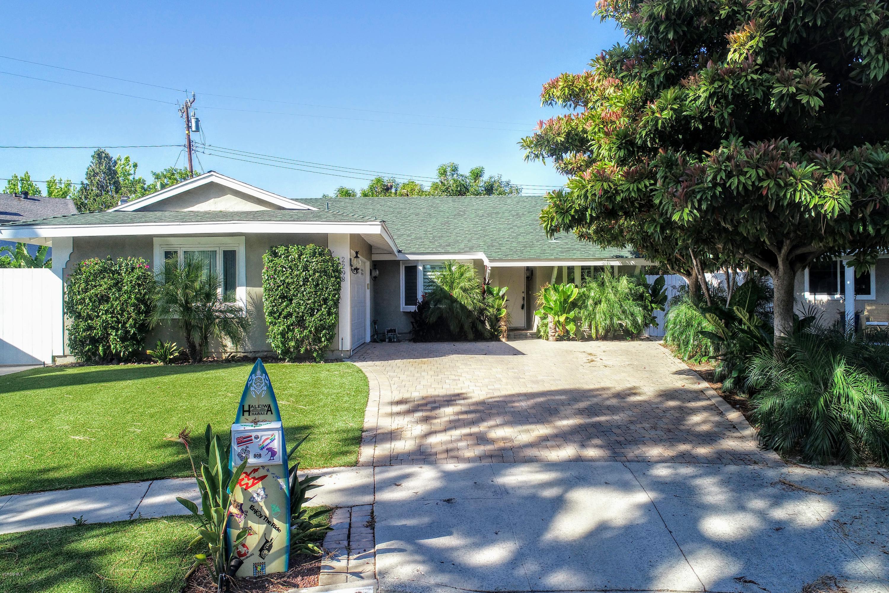 2298 Copley Street Simi Valley, CA 93063 - Photo 1 of 51 a front view of a house with a yard