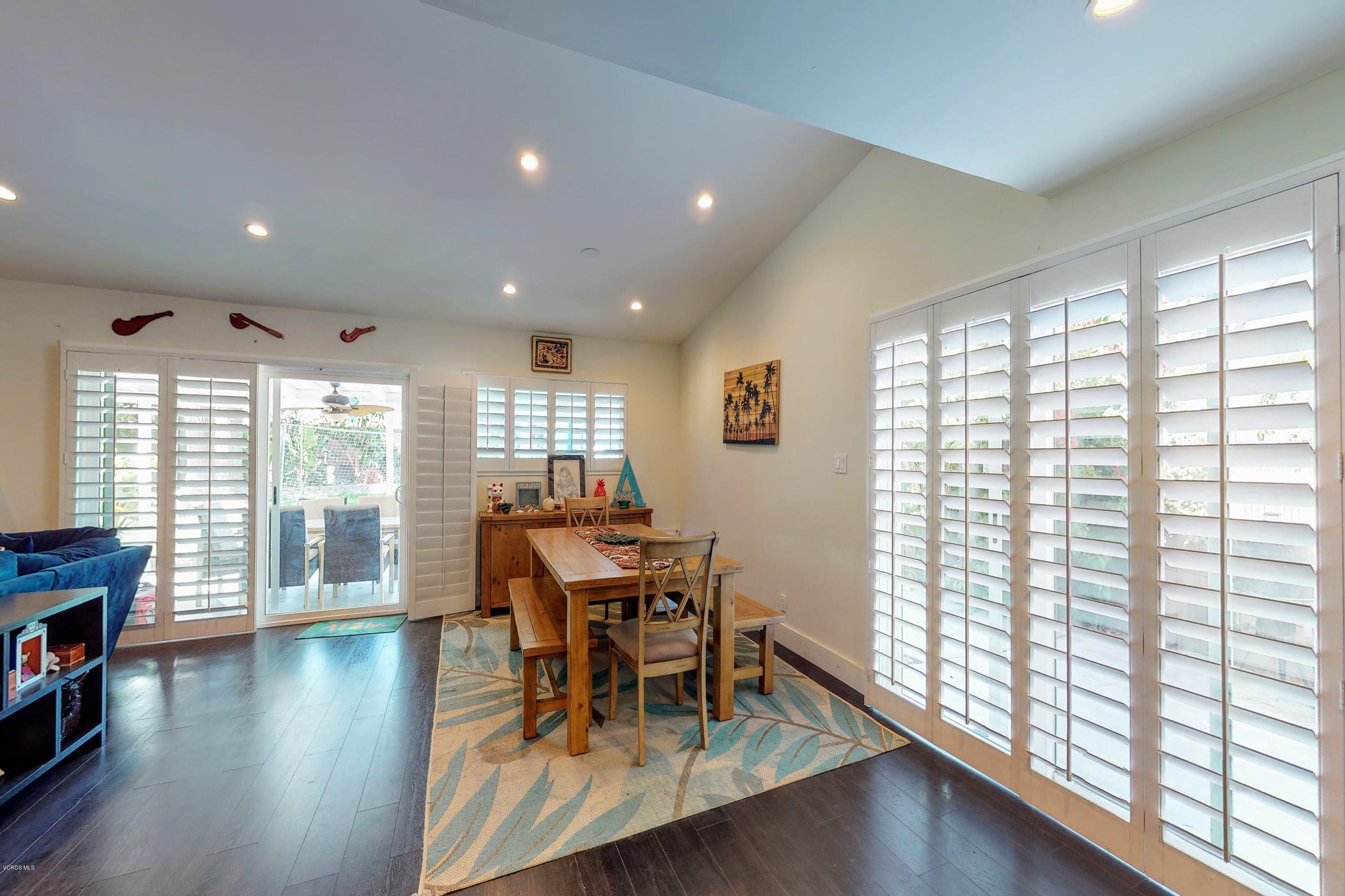 2298 Copley Street Simi Valley, CA 93063 - Photo 14 of 51 a view of a dining room with furniture and wooden floor