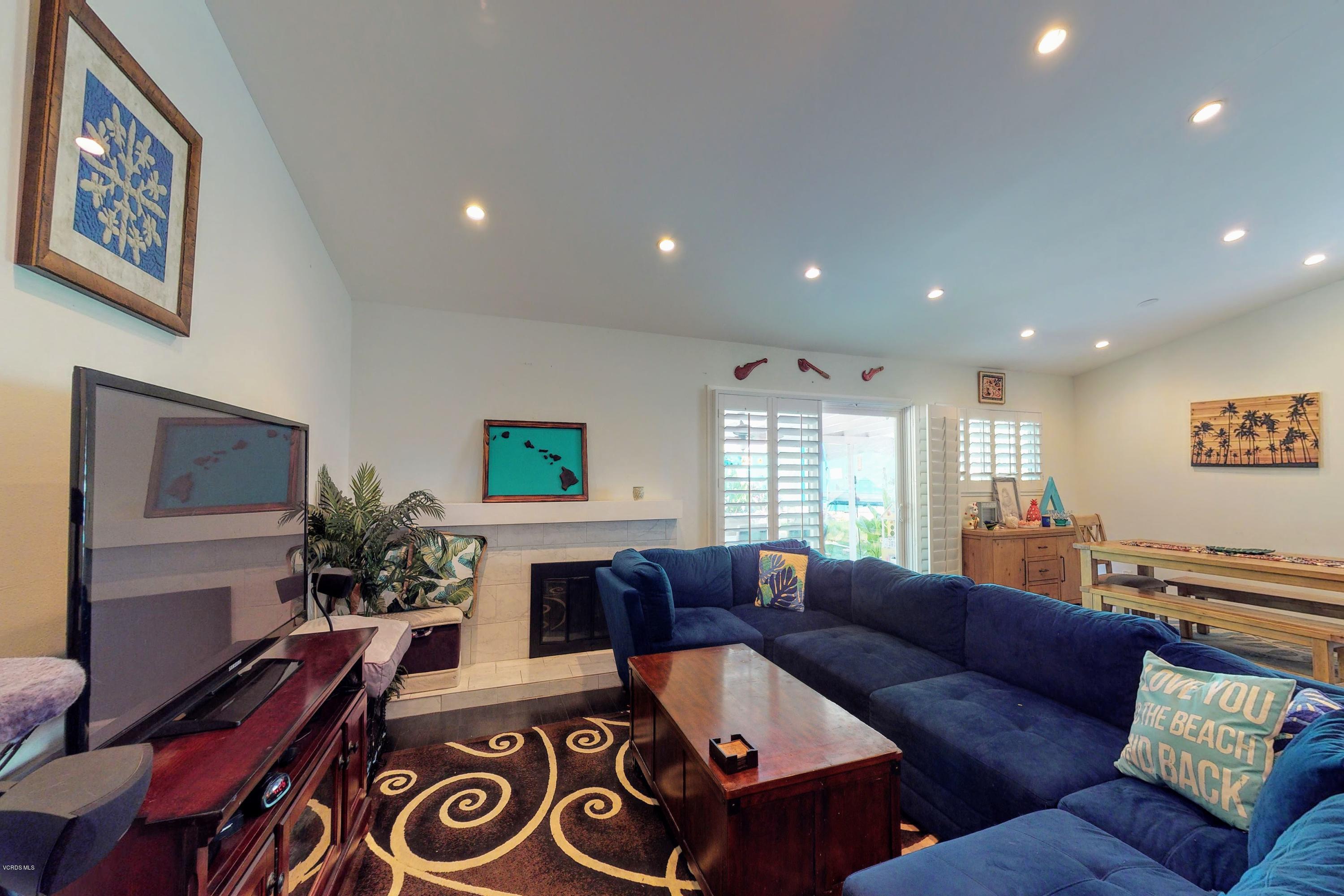 2298 Copley Street Simi Valley, CA 93063 - Photo 18 of 51 a living room with furniture and a flat screen tv