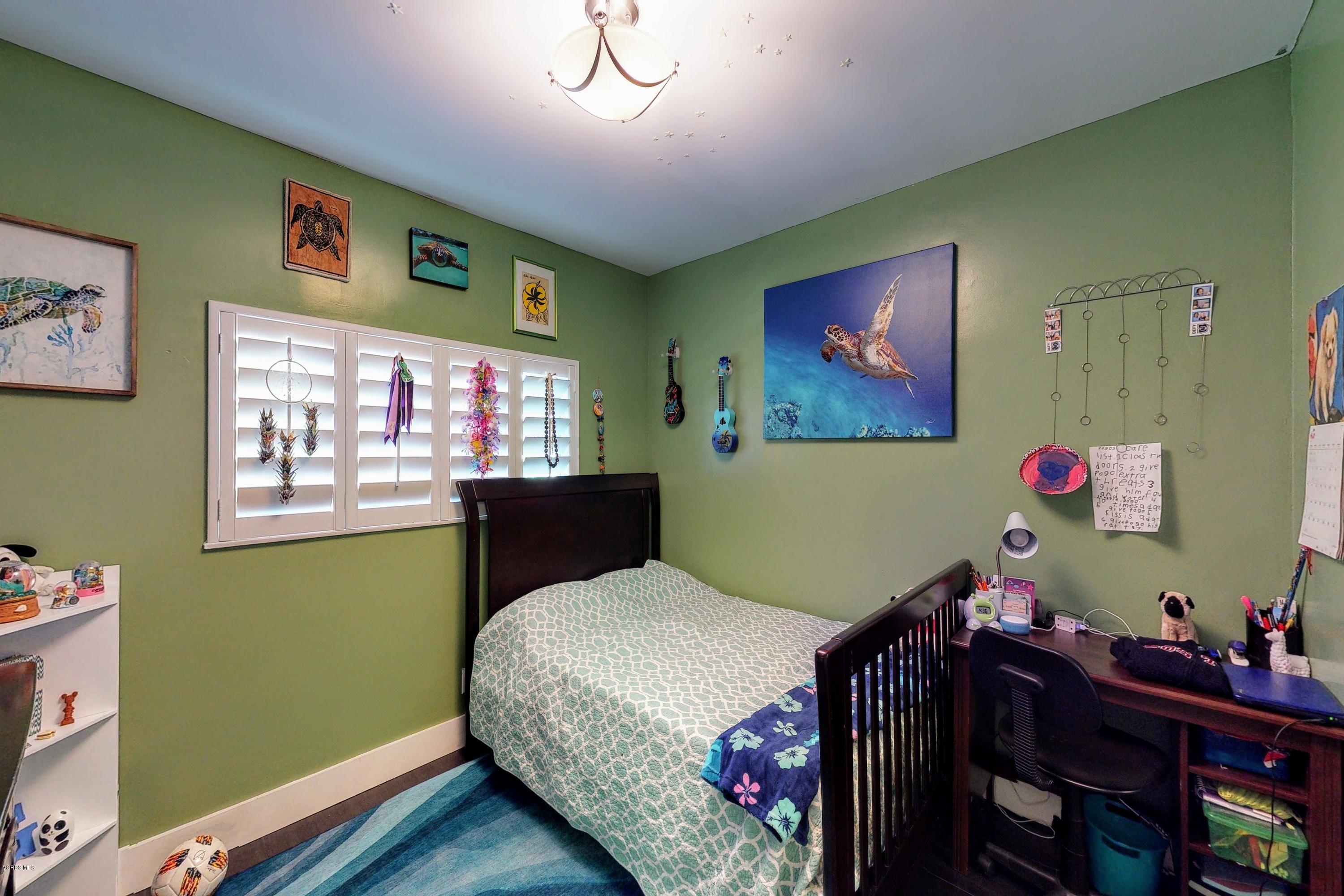 2298 Copley Street Simi Valley, CA 93063 - Photo 26 of 51 a bed room with a bed and a fish tank