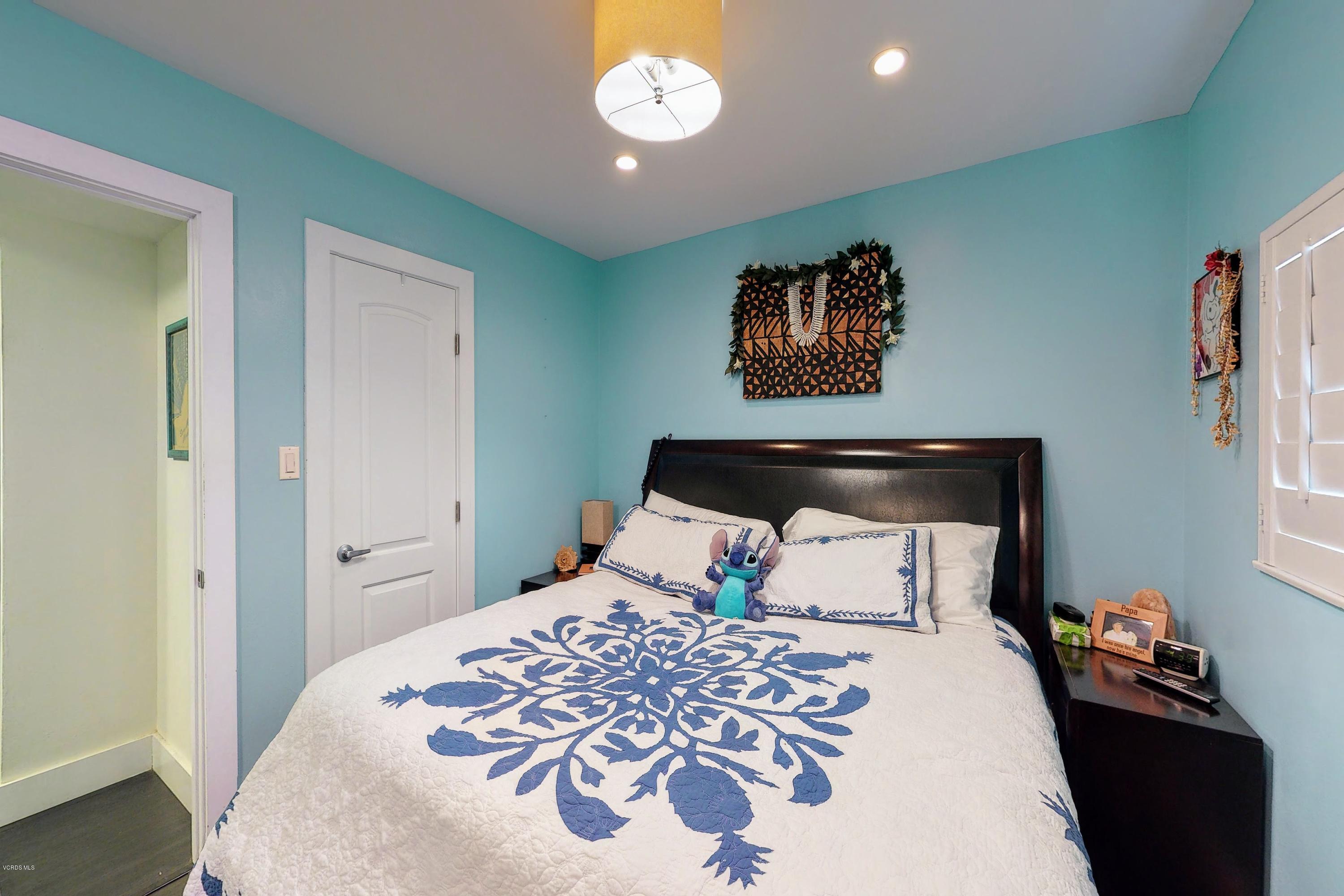 2298 Copley Street Simi Valley, CA 93063 - Photo 31 of 51 a bedroom with a bed and a window