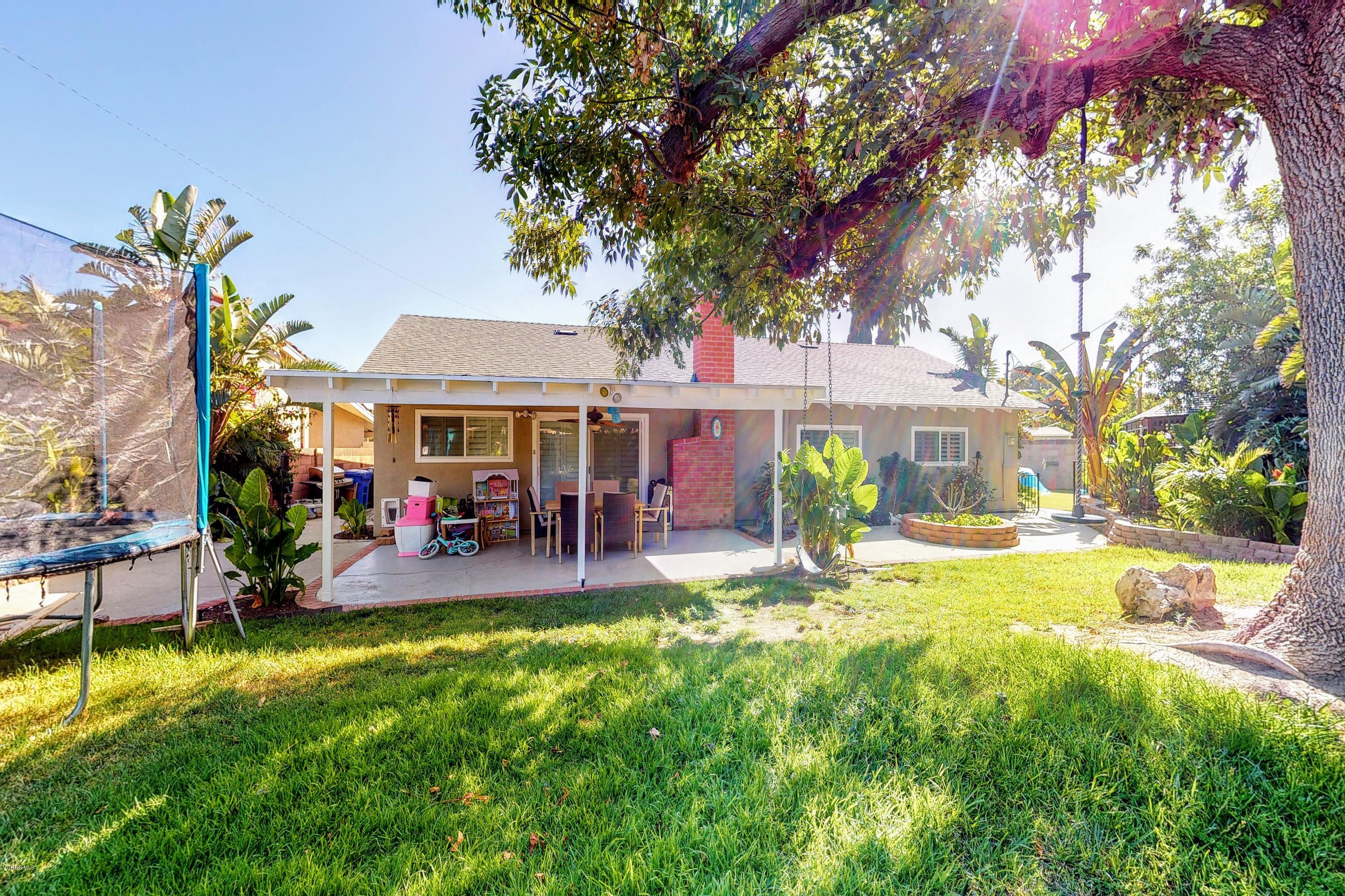 2298 Copley Street Simi Valley, CA 93063 - Photo 39 of 51 a view of a house with a yard patio and fire pit