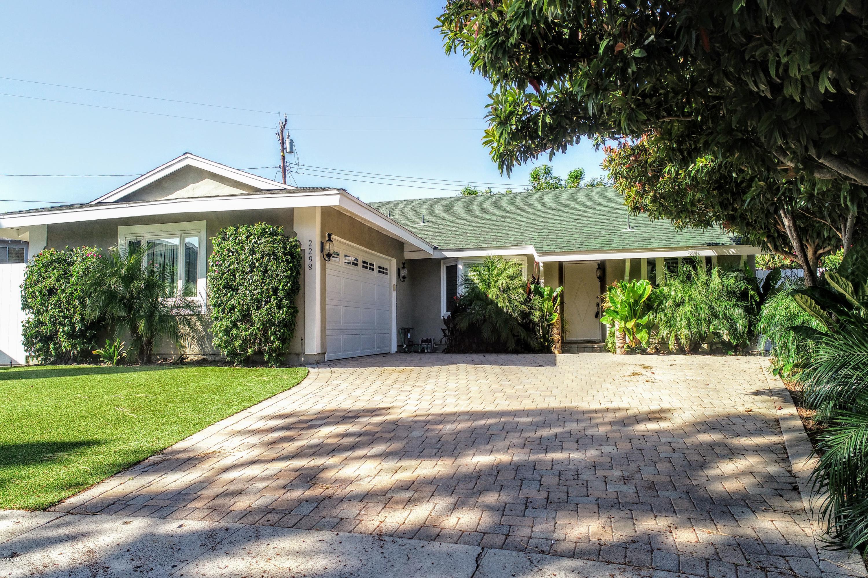 2298 Copley Street Simi Valley, CA 93063 - Photo 49 of 51 a front view of a house with a yard