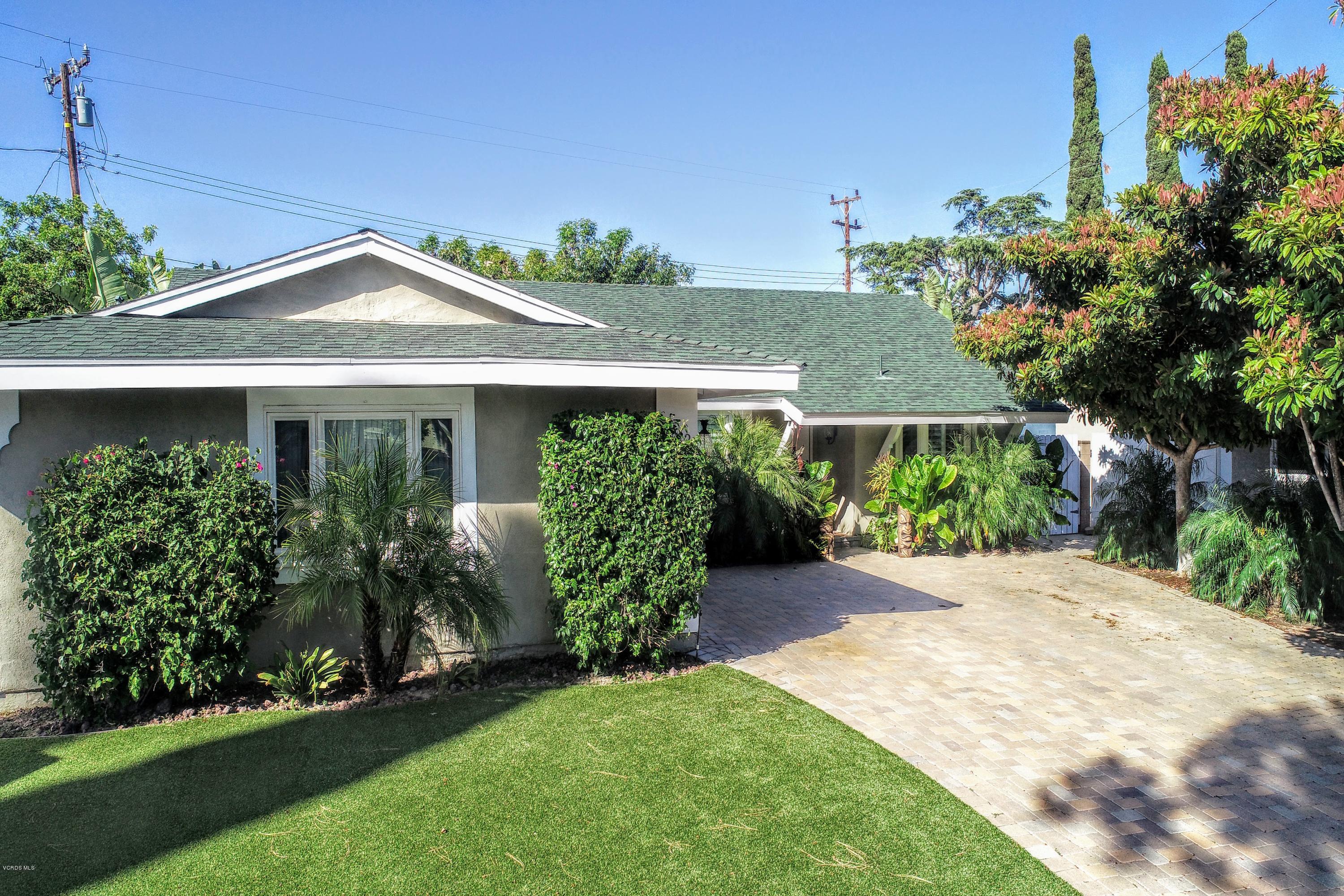 2298 Copley Street Simi Valley, CA 93063 - Photo 50 of 51 a front view of a house with a yard