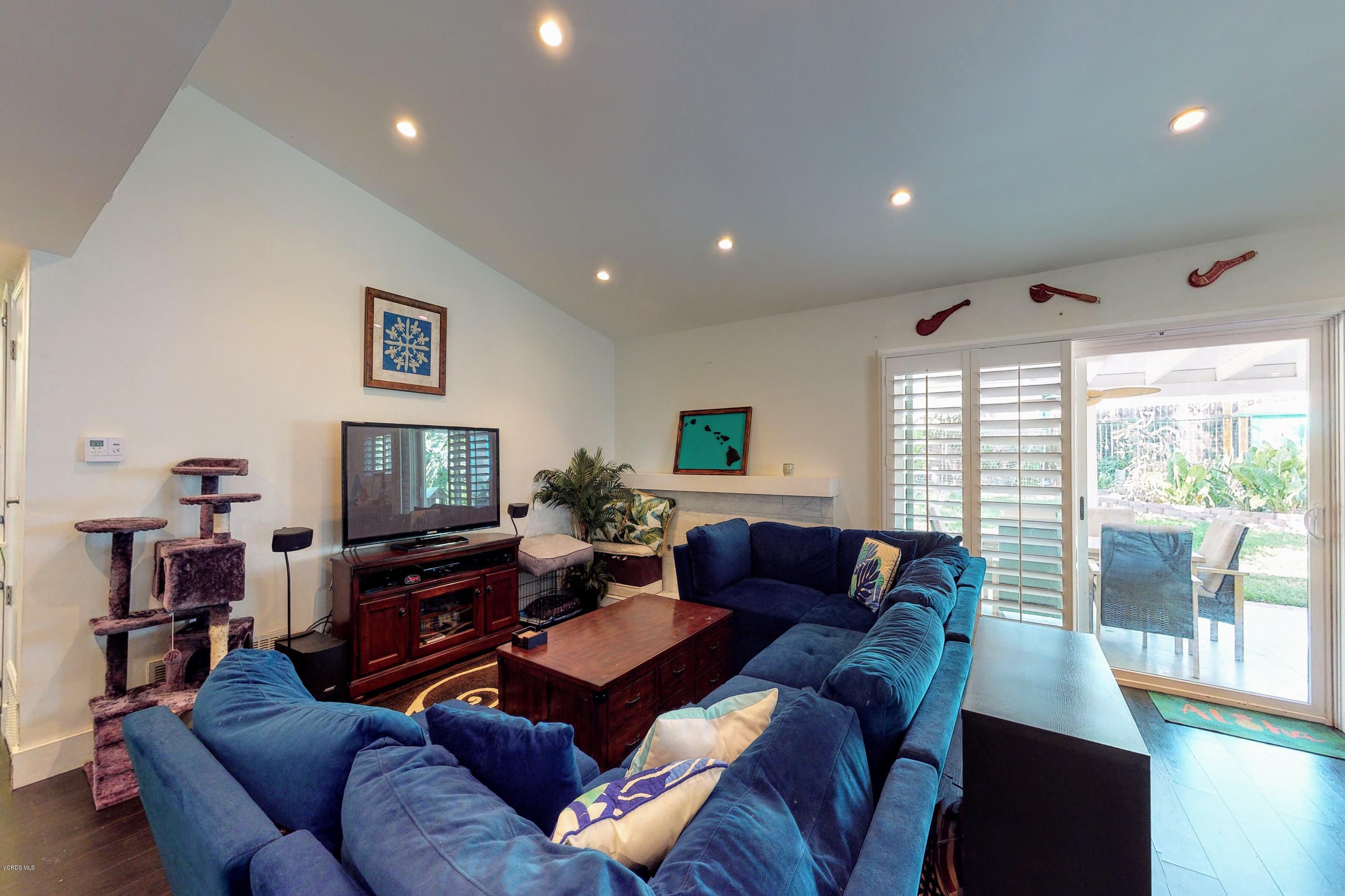 2298 Copley Street Simi Valley, CA 93063 - Photo 6 of 51 a living room with furniture and a flat screen tv
