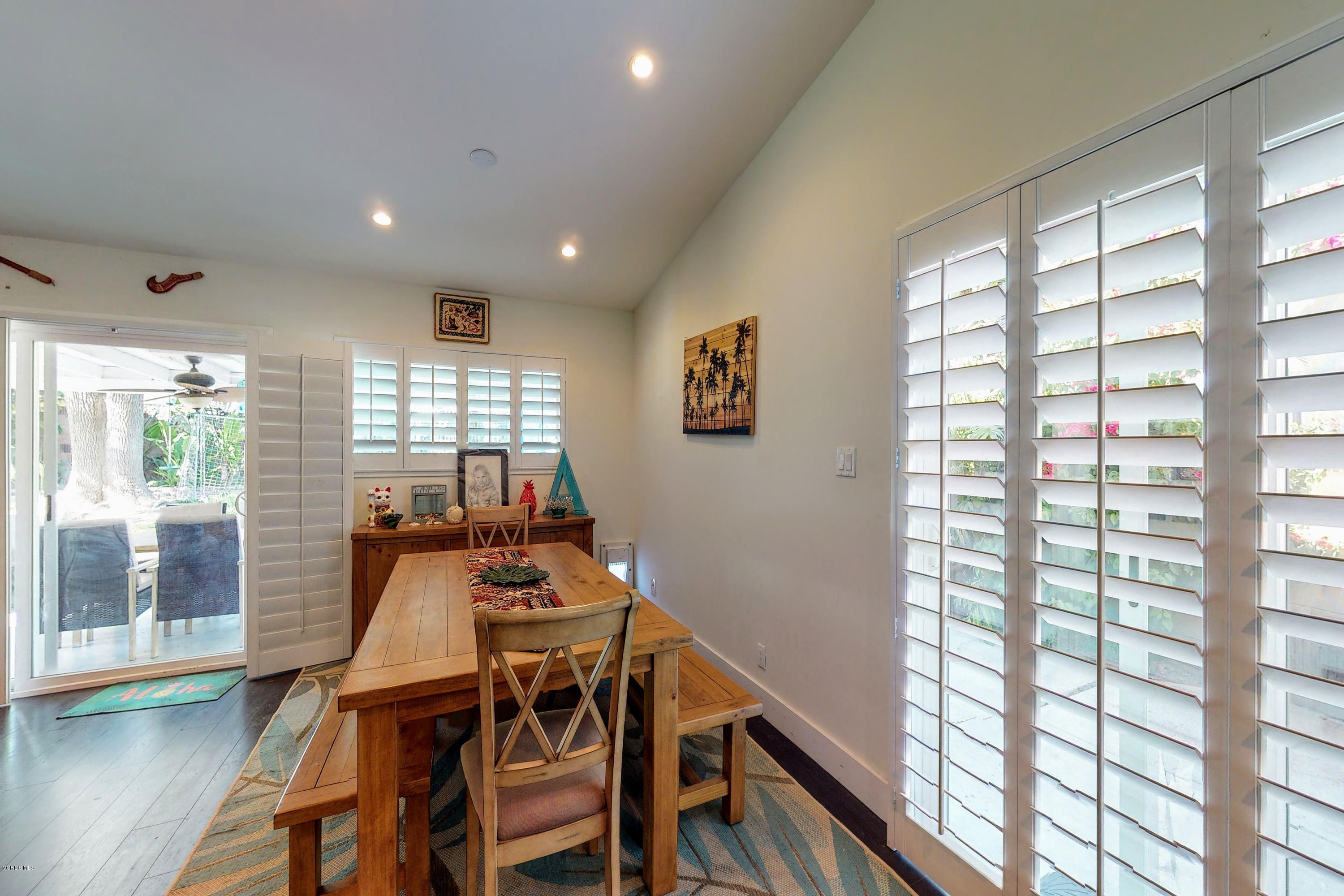 2298 Copley Street Simi Valley, CA 93063 - Photo 7 of 51 a view of a dining room with furniture and wooden floor