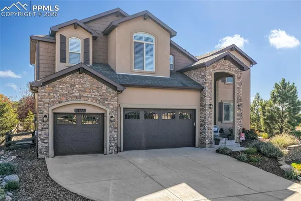 a front view of a house with yard
